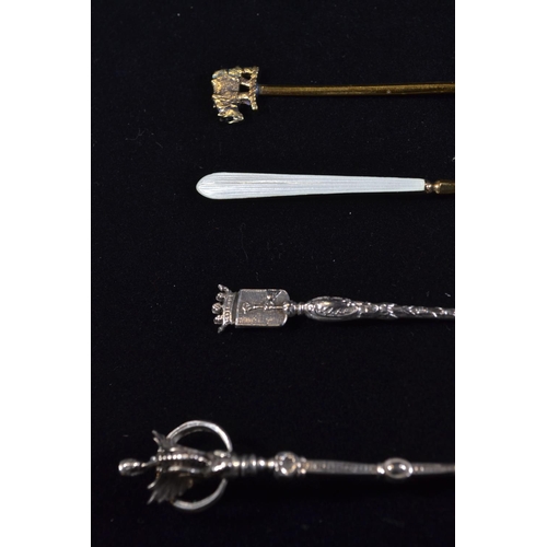 385 - Two silver gilt and enamel 'The Worshipful Society of Apothecaries' coffee spoons with rhino symbol,... 