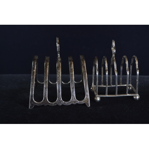 387 - Two silver toast racks, Mappin & Webb Ltd and William Base & Sons Birmingham 1932 and 1928 r... 