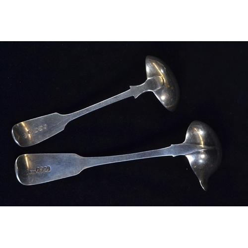 390 - Two silver fiddle pattern sauce ladles, including: George IV Irish sauce ladle with pouring lip... 