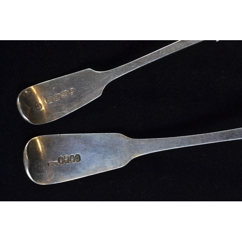 390 - Two silver fiddle pattern sauce ladles, including: George IV Irish sauce ladle with pouring lip... 