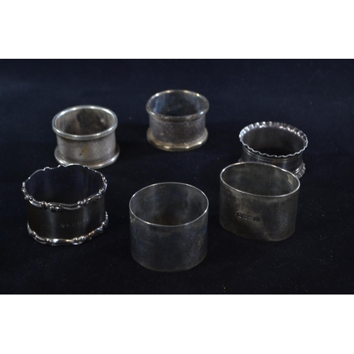 392 - Six silver napkin rings, various maker's and dates, including a pair, each inscribed/initialled, gro... 