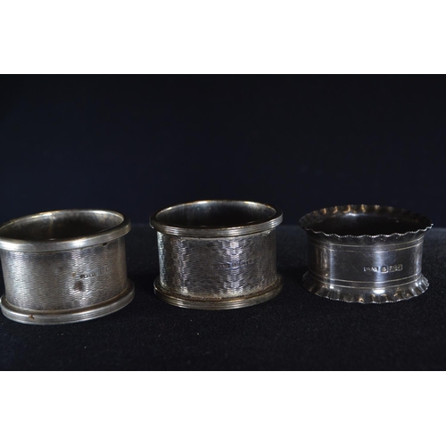 392 - Six silver napkin rings, various maker's and dates, including a pair, each inscribed/initialled, gro... 