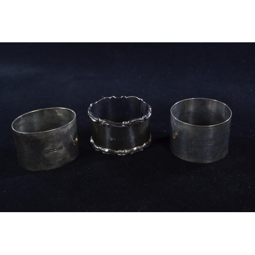 392 - Six silver napkin rings, various maker's and dates, including a pair, each inscribed/initialled, gro... 