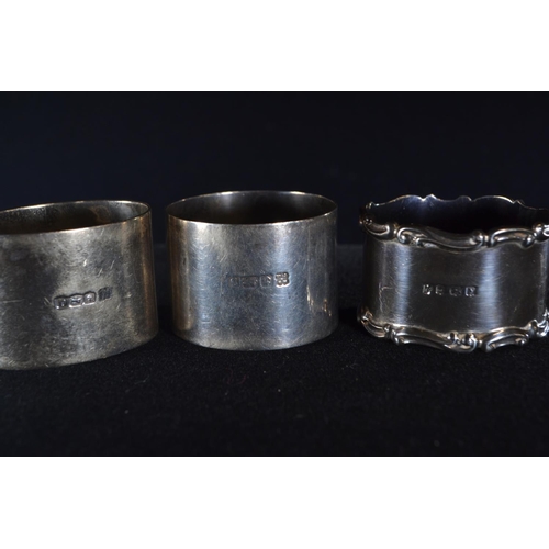 392 - Six silver napkin rings, various maker's and dates, including a pair, each inscribed/initialled, gro... 