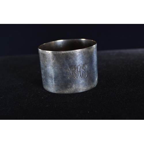 392 - Six silver napkin rings, various maker's and dates, including a pair, each inscribed/initialled, gro... 