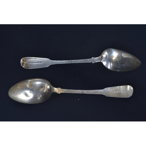 402 - Two silver fiddle pattern serving spoons, makers James Payne and JW respectively, London 1824 and 18... 