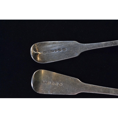 402 - Two silver fiddle pattern serving spoons, makers James Payne and JW respectively, London 1824 and 18... 