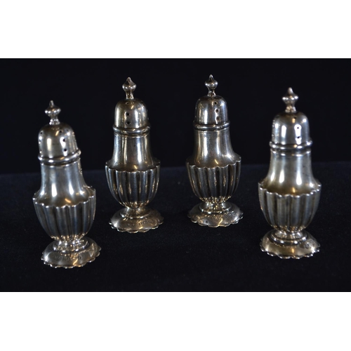 408 - Set of four silver pepperettes, William Aitken, Birmingham 1902 and 1903, height 7.5cm, gross w... 