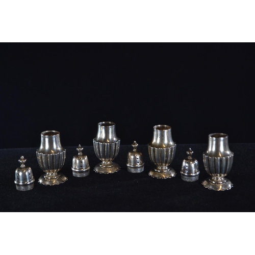 408 - Set of four silver pepperettes, William Aitken, Birmingham 1902 and 1903, height 7.5cm, gross w... 