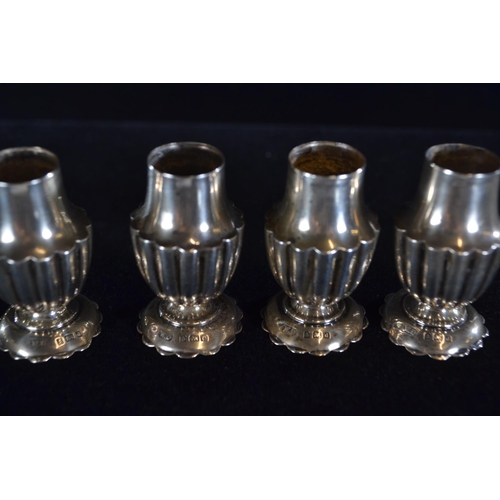 408 - Set of four silver pepperettes, William Aitken, Birmingham 1902 and 1903, height 7.5cm, gross w... 