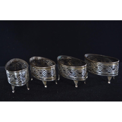 413 - Set of four silver pierced navette-shaped salts, William Aitken, Birmingham 1903, with blue glass li... 