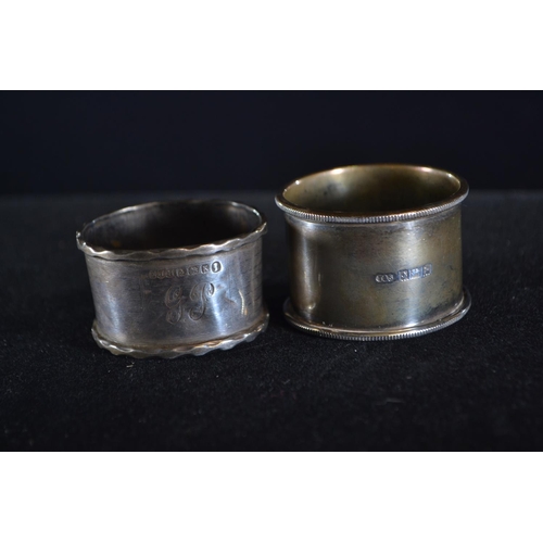 420 - Eight silver napkin rings, various makers and dates, including a pair and one 830 silver, gross weig... 