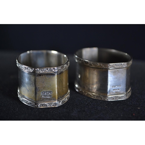 420 - Eight silver napkin rings, various makers and dates, including a pair and one 830 silver, gross weig... 