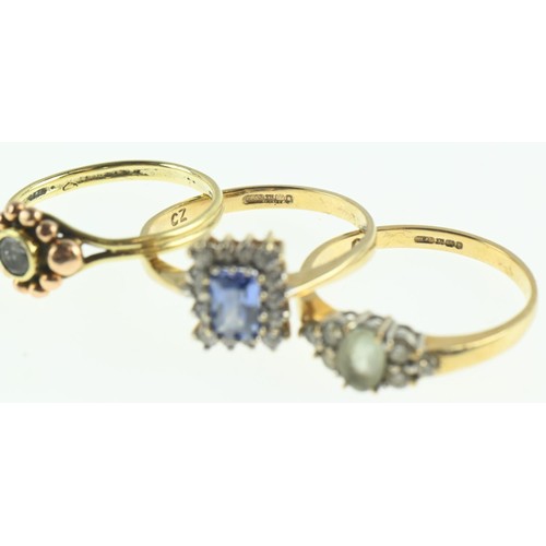 234 - Three 9ct gold gem-set rings, gross weight 5.8 grams