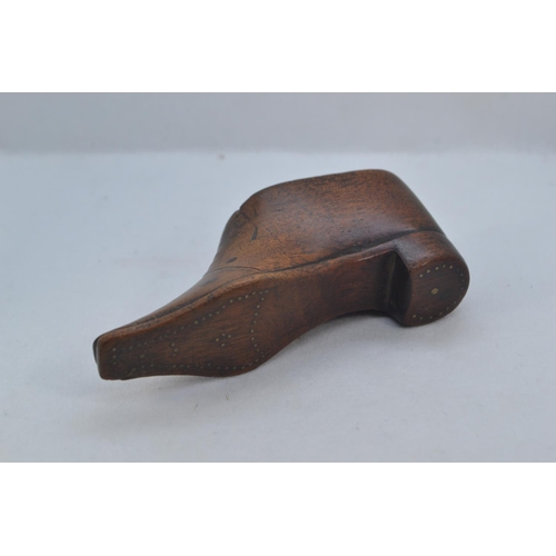 484 - 19th century carved wood shoe snuff box, with sliding cover and metal pinned decoration, length 10cm