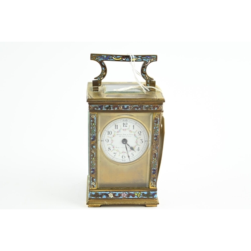 489 - An early C20th French brass carriage clock, case inset with champleve enamel, and with bevel edged g... 