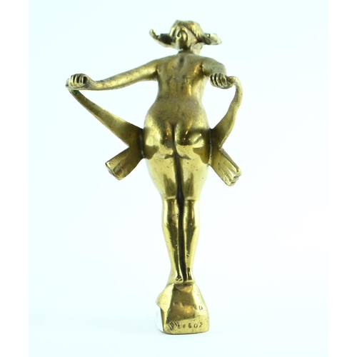 491 - Brass car mascot in the form of a nude leaning into the wind, stamped NLC co. to front base, indisti... 