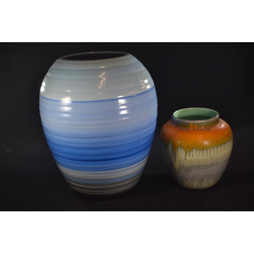 546 - Two pieces of Shelley: blue Harmony Ware banded vase, 22cm height and and an orange Harmony Drip jar... 