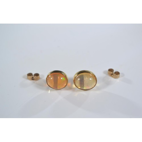 242 - Pair of fire opal ear studs set in yellow metal with 9ct gold butterflies, 10mm x 8mm approx, gross ... 