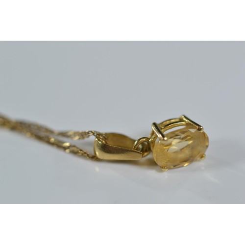 247 - 18ct gold and citrine pendant and earring set on a 9ct gold chain. Gross weight 2.50g