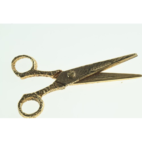 256 - 9ct gold scissor charm, length 37mm, 2.8 grams