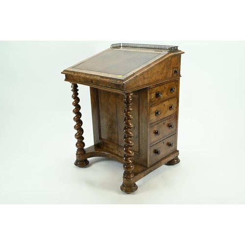 523 - Leather topped galleried Davenport with four external drawers, two internal drawers, an ink well and... 