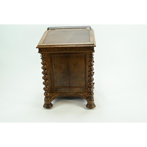 523 - Leather topped galleried Davenport with four external drawers, two internal drawers, an ink well and... 