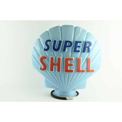 597 - A blue Super Shell glass petrol pump globe, circa 1960's, in good condition, stamped inside 'Propert... 