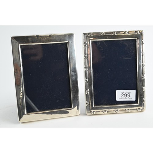 299 - Two silver rectangular photo frames, Carr's of Sheffield Ltd, Sheffield 1986 and 1990 respectively, ... 