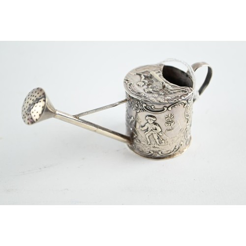 353 - Miniature silver watering can with embossed with figures and scrolling, import marks for London 1900... 