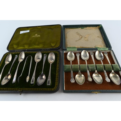 403 - Two cased sets of silver coffee spoons, including: late Victorian set of six spoons with sugar nips ... 