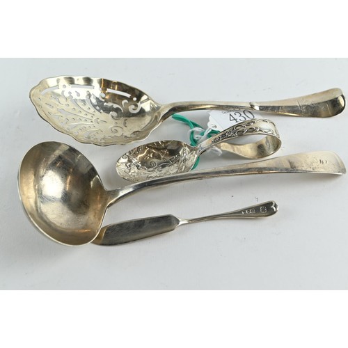 430 - Four pieces of silver flatware, including: a George III sauce ladle, London 1806; Dutch silver strai... 