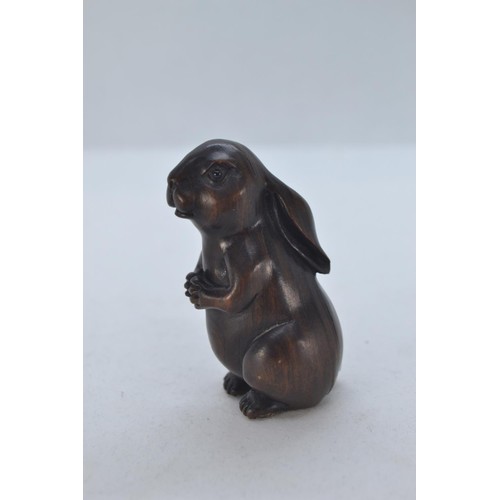 479 - Netsuke carved into a small Hare. H5.5 cm