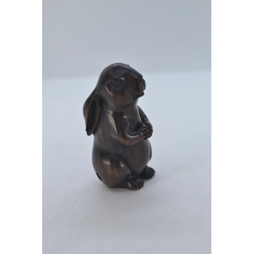 479 - Netsuke carved into a small Hare. H5.5 cm