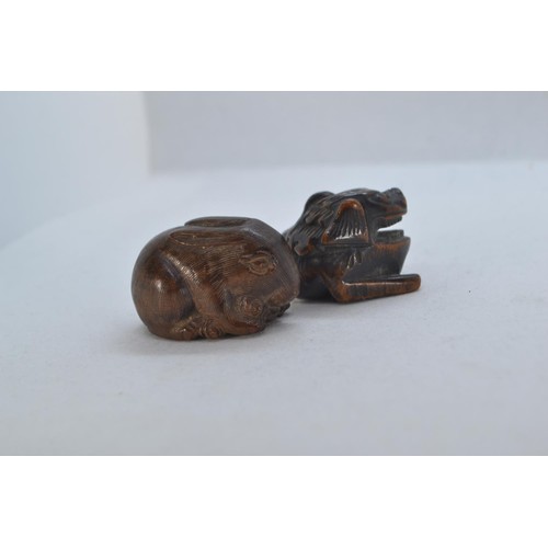 481 - Two Netsuke, including one rabbit and a dragon carved hardwood.