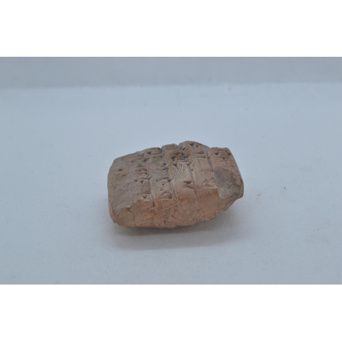 486 - Sumerian style miniature stone tablet with carved detail in a soft shade of pink/natural.