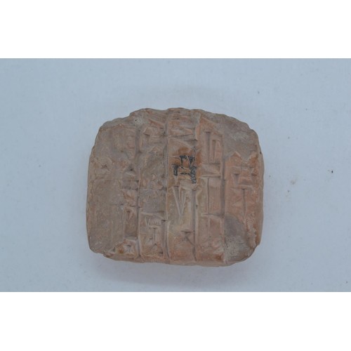 486 - Sumerian style miniature stone tablet with carved detail in a soft shade of pink/natural.