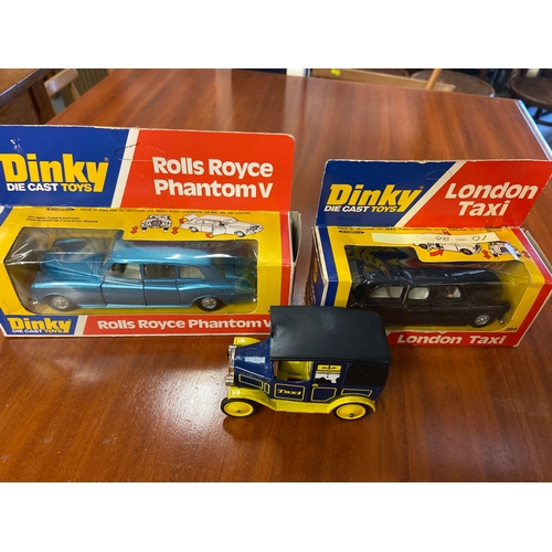 577 - Three Dinky Die Cast Toys, Rolls Royce Phantom V , London Taxi and Vintage Taxi.