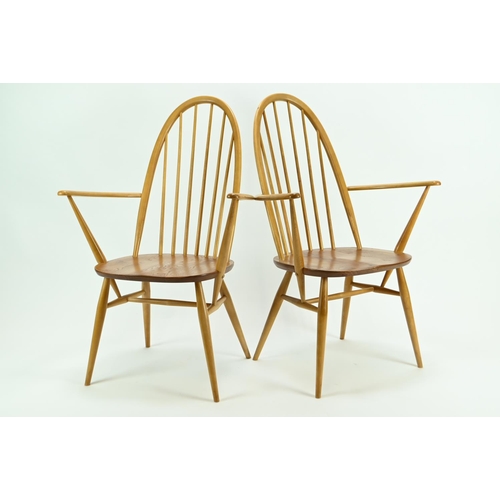 685 - Pair of Ercol 365A Quaker armchairs. Natural finish, with original seat pads.