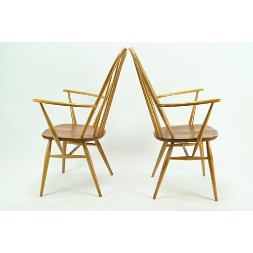 685 - Pair of Ercol 365A Quaker armchairs. Natural finish, with original seat pads.