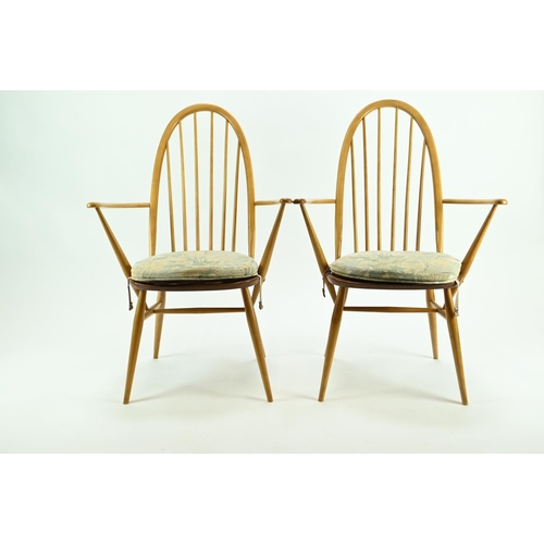 685 - Pair of Ercol 365A Quaker armchairs. Natural finish, with original seat pads.