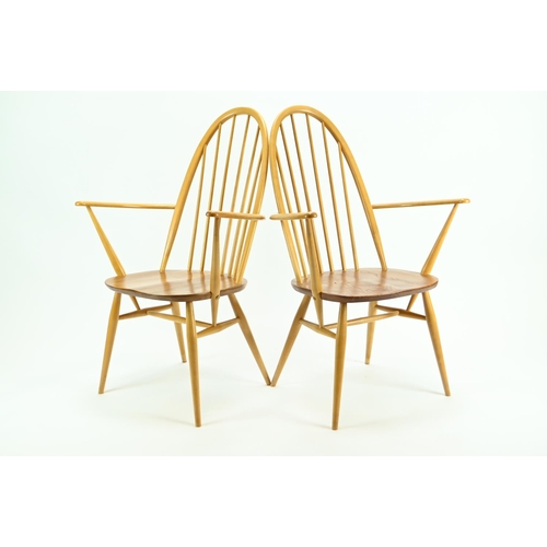 687 - Pair of Ercol 365A Quaker armchairs. Natural finish, with original seat pads.