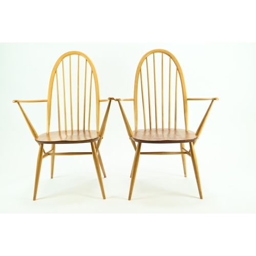 687 - Pair of Ercol 365A Quaker armchairs. Natural finish, with original seat pads.