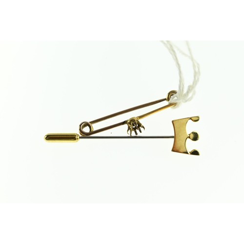 236A - Crown tie pin with 9ct gold tip and cover, together with a yellow metal pin with missing stone, gros... 