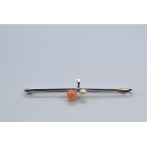 237 - 9ct white gold bar brooch set with pearl and (possibly) conch pearl together with a paste bar brooch... 