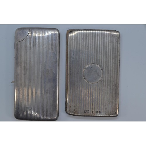 391 - Two silver mounted folding card cases, Mappin & Webb Ltd and the other with maker's mark ru... 