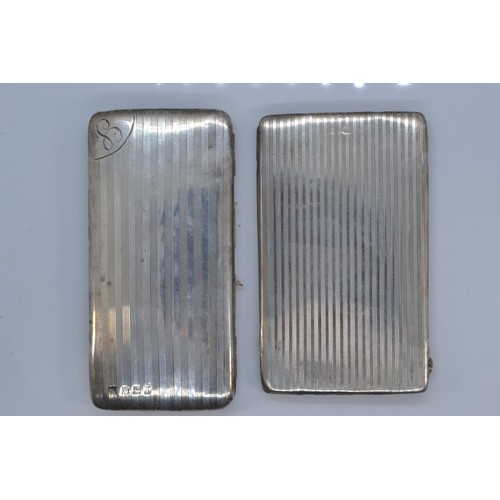 391 - Two silver mounted folding card cases, Mappin & Webb Ltd and the other with maker's mark ru... 