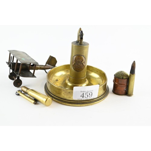 459 - Collection of Trench Art, cigarette lighters and one ash tray. Coins at base of ash tray and one pin... 