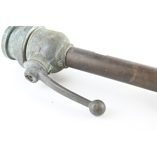 470 - Nozzle of a fireman's hose with lettering MCA DIN 1669  solid brass. L 45 cm