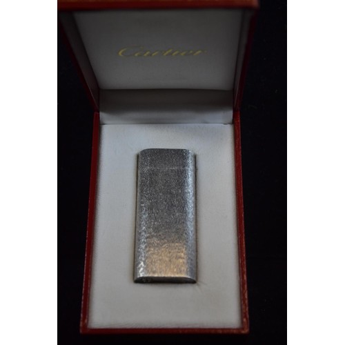 494 - Cartier Paris steel cigarette lighter. Swiss made. Serial no. E41221